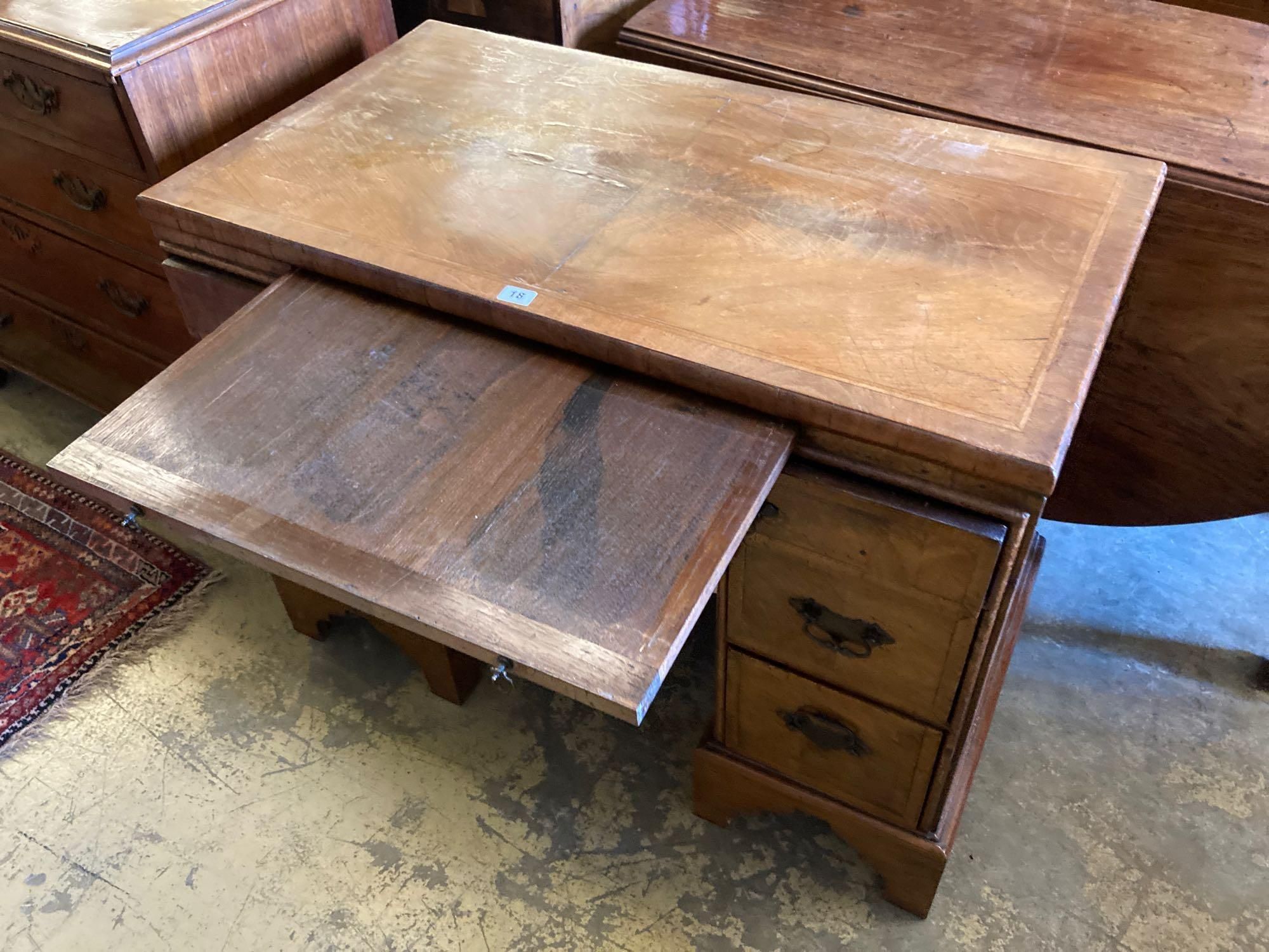 A walnut kneehole dressing table/desk, incorporating antique timbers, width 95cm height 75cm